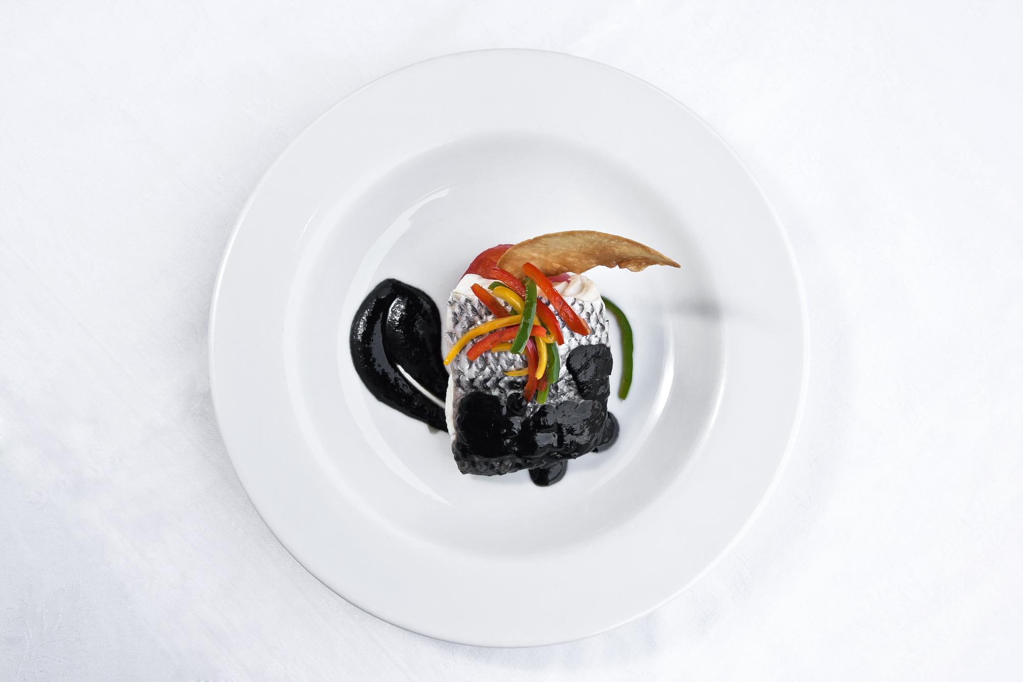 Close-up plated gourmet dish with elegant plating